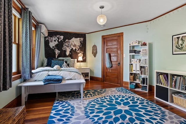18 Hill St, Lexington, MA 02421 - bedroom with wood finished floors, crown molding, a wall unit AC, and baseboards