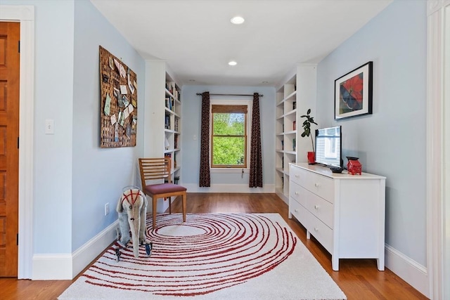 18 Hill St, Lexington, MA 02421 - sitting room featuring light wood-type flooring, baseboards, and recessed lighting