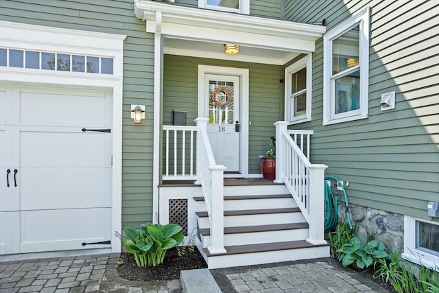 18 Hill St, Lexington, MA 02421 - view of exterior entry featuring a garage