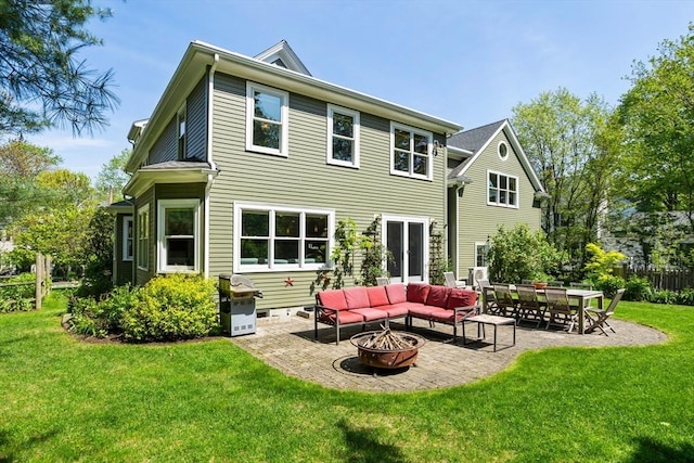 18 Hill St, Lexington, MA 02421 - back of property with a patio area and an outdoor living space with a fire pit
