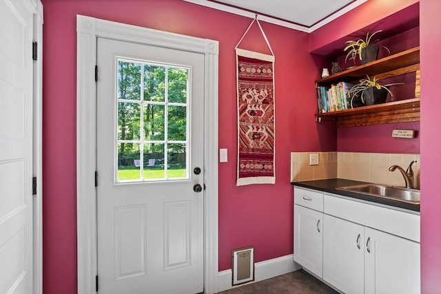 18 Hill St, Lexington, MA 02421 - doorway featuring plenty of natural light, baseboards, and wet bar