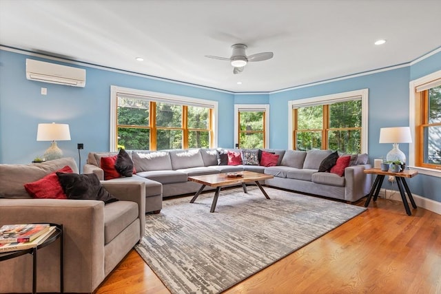 18 Hill St, Lexington, MA 02421 - living room with a wall unit AC, crown molding, ceiling fan, light wood-style flooring, and recessed lighting