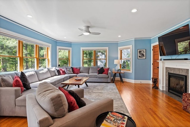 18 Hill St, Lexington, MA 02421 - living room featuring a ceiling fan, ornamental molding, baseboards, recessed lighting, and a tile fireplace