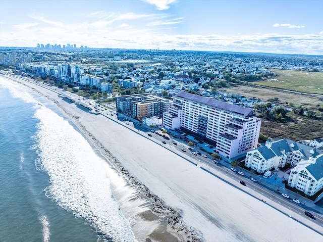 view of urban area featuring extended coastline