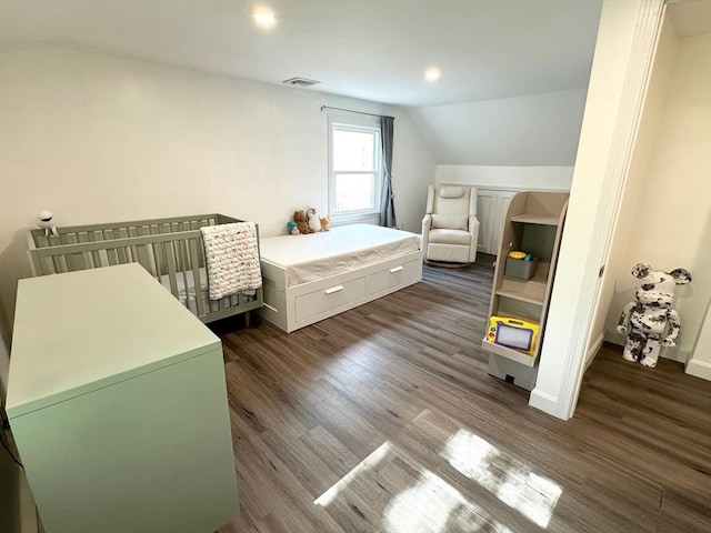 197 Winn St, Burlington, MA 01803 - bedroom with baseboards, visible vents, lofted ceiling, and dark wood-type flooring