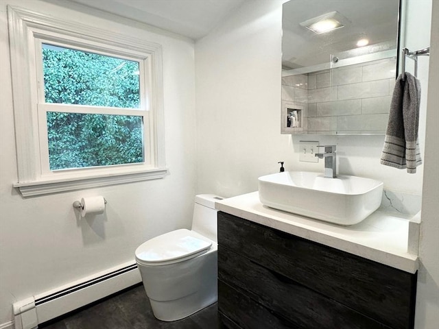 197 Winn St, Burlington, MA 01803 - bathroom featuring vanity, a baseboard radiator, walk in shower, and toilet