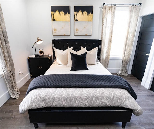 bedroom featuring hardwood / wood-style flooring