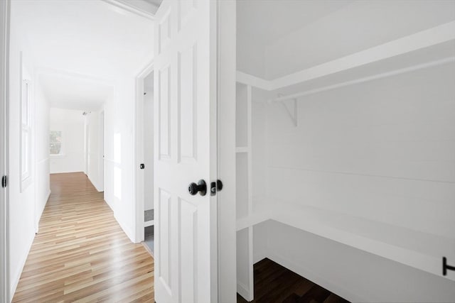 hallway featuring light wood-type flooring