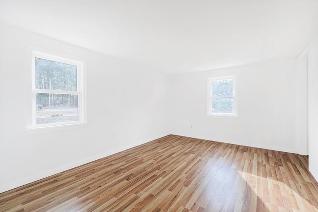 unfurnished room featuring light hardwood / wood-style flooring