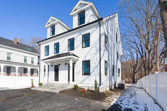 view of front of house featuring central AC unit