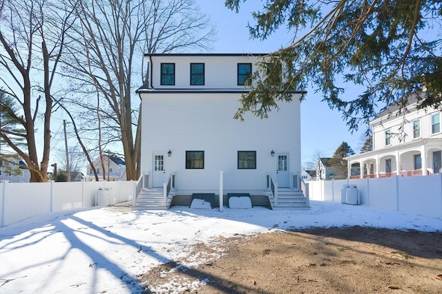 view of snow covered house