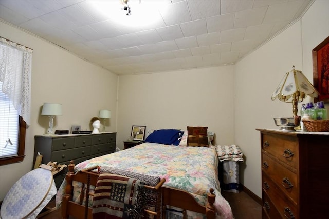 bedroom with ornamental molding