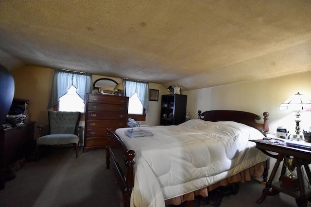 bedroom with vaulted ceiling, a textured ceiling, and carpet