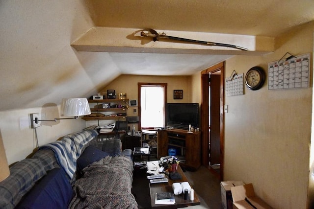 living area featuring lofted ceiling