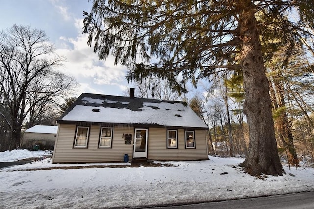 view of snow covered property