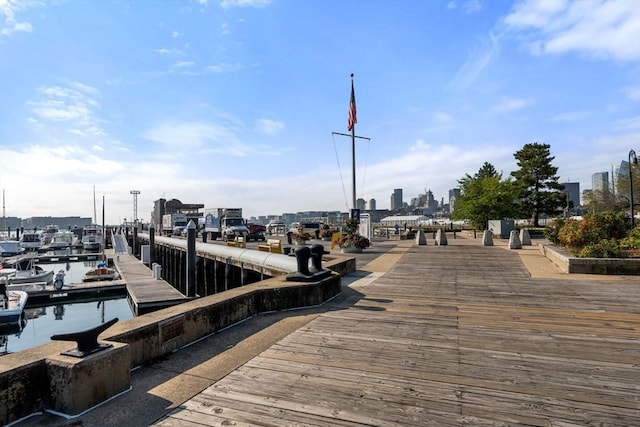 view of dock with a view of city