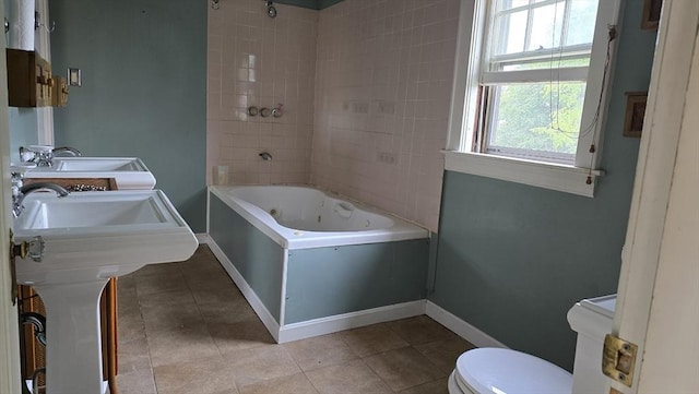 10 Arbutus Rd, Worcester, MA 01606 - bathroom featuring toilet, dual sinks, tile patterned floors, and baseboards