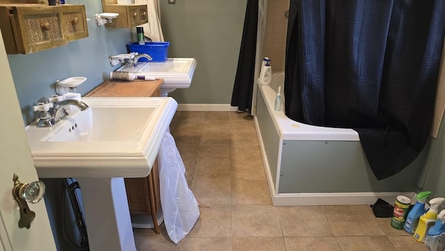 10 Arbutus Rd, Worcester, MA 01606 - bathroom with a sink, tile patterned flooring, shower / bath combination with curtain, and baseboards