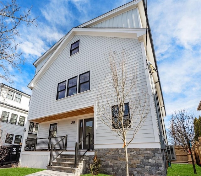 view of front of property featuring covered porch and board and batten siding