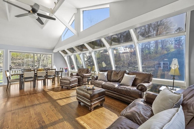 sunroom featuring beamed ceiling