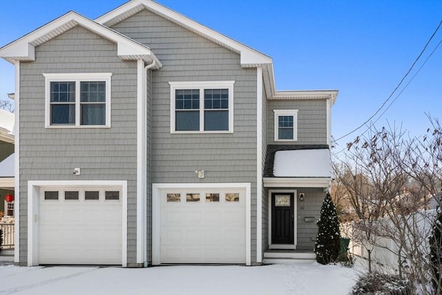 view of front of property with a garage