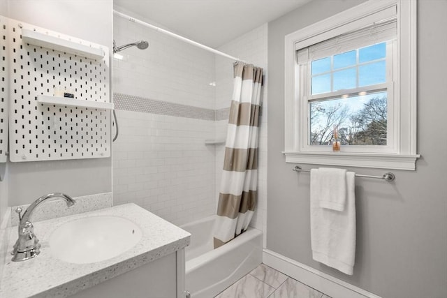 bathroom with vanity and shower / bath combo with shower curtain