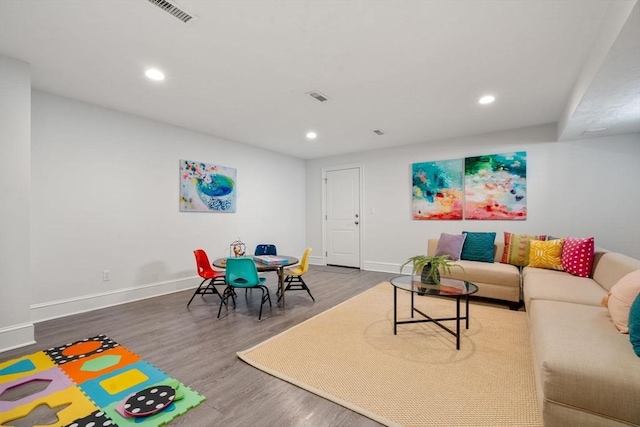 living room with hardwood / wood-style flooring