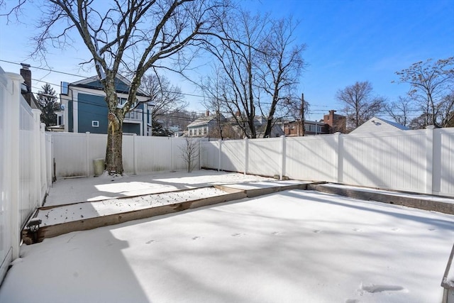 view of snow covered patio