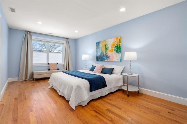 bedroom featuring hardwood / wood-style flooring