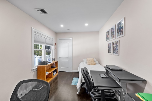 office space with dark hardwood / wood-style flooring