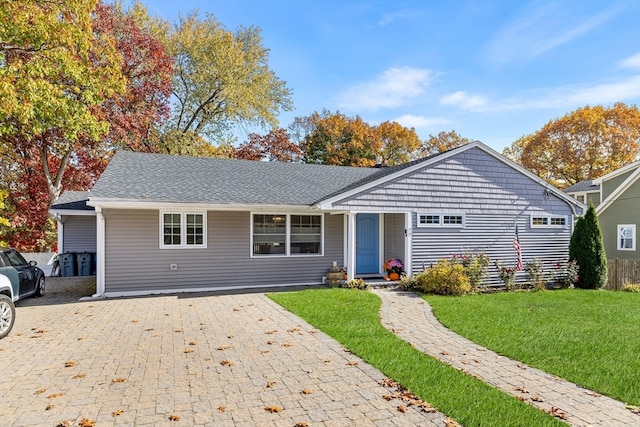 ranch-style house with a front yard