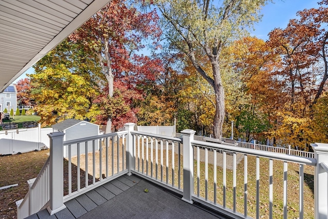 deck with a storage shed