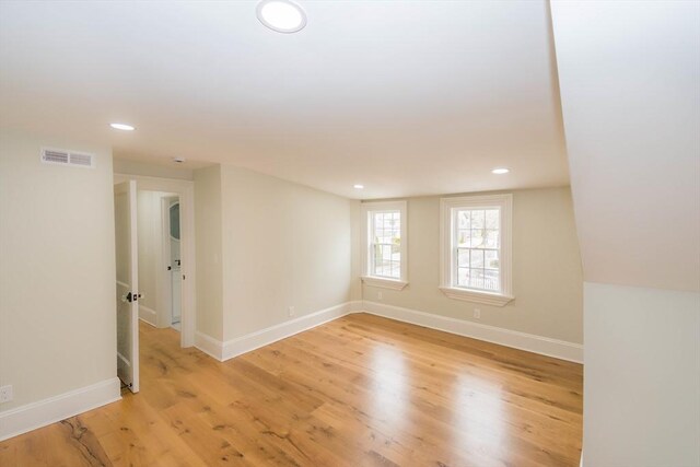 unfurnished room featuring visible vents, recessed lighting, baseboards, and light wood-style floors
