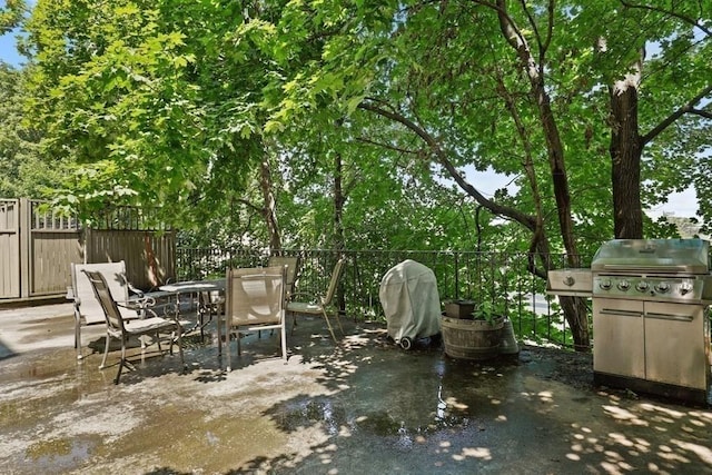 115 Highland Ave Unit 11, Somerville, MA 02143 - view of patio featuring outdoor dining space and a grill