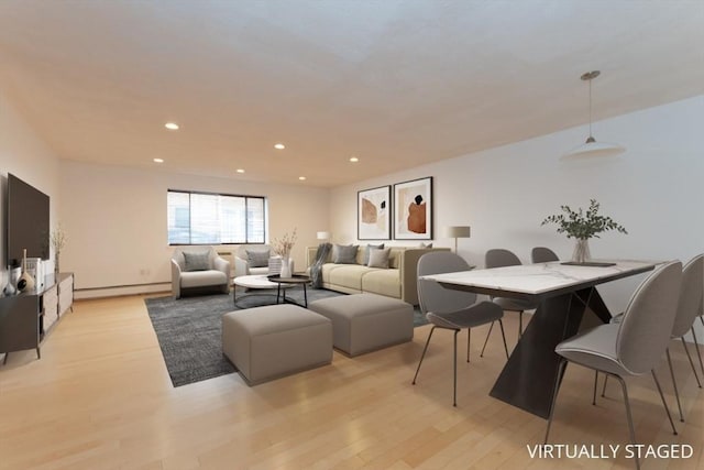 115 Highland Ave Unit 11, Somerville, MA 02143 - living room featuring a baseboard heating unit, light wood-type flooring, and recessed lighting