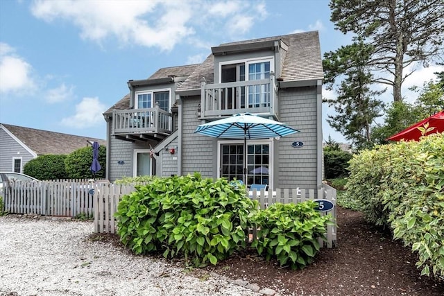 5 Hydrangea Ln Unit 5, Mashpee, MA 02649 - rear view of house featuring a balcony and roof with shingles