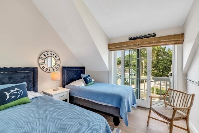 5 Hydrangea Ln Unit 5, Mashpee, MA 02649 - bedroom with access to exterior, light wood-style floors, and vaulted ceiling