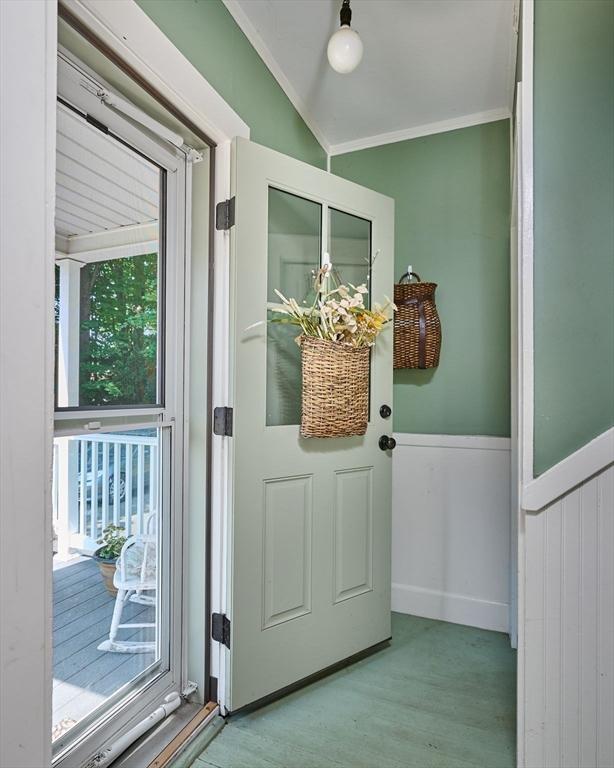 154 N Maple St, Northampton, MA 01062 - entryway featuring light wood-style floors and crown molding