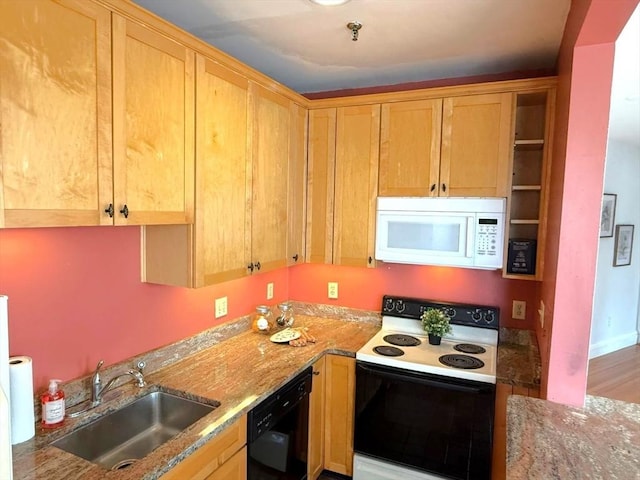 kitchen with electric stove, white microwave, black dishwasher, a sink, and light stone countertops