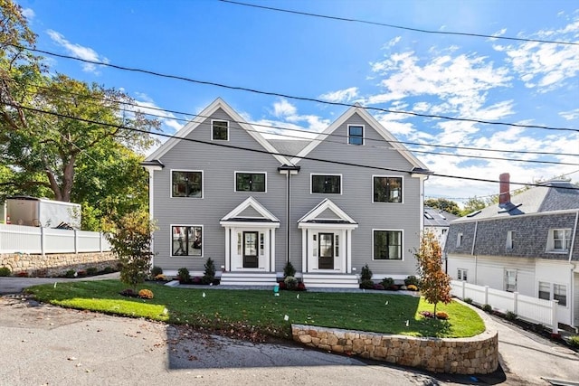 view of front of home featuring a front yard