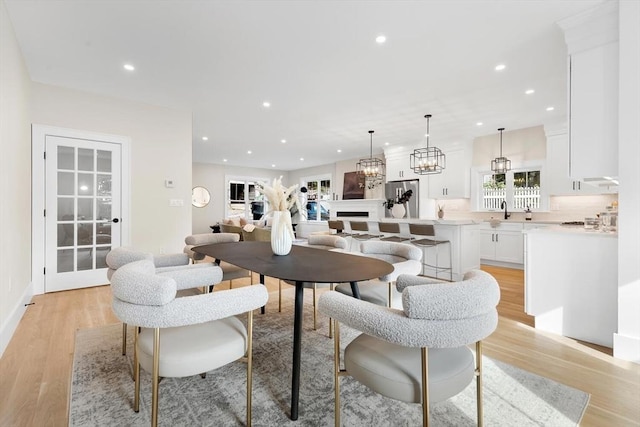 dining room featuring light hardwood / wood-style flooring