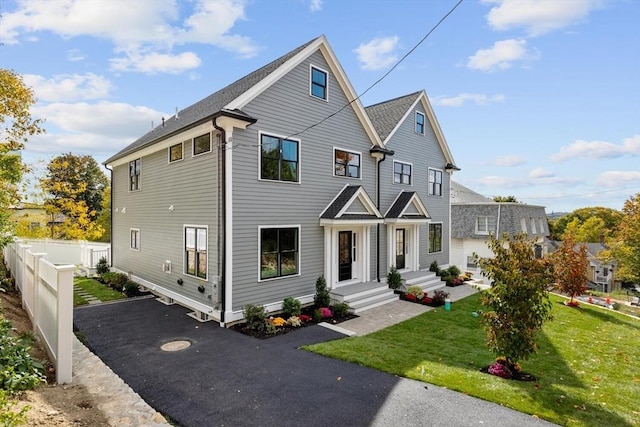 view of front facade with a front lawn