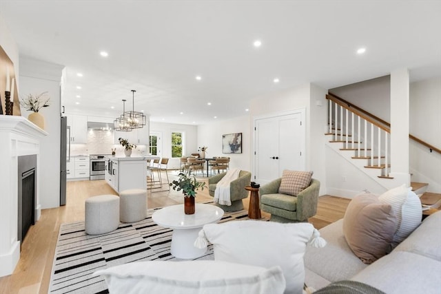 living room with light hardwood / wood-style floors