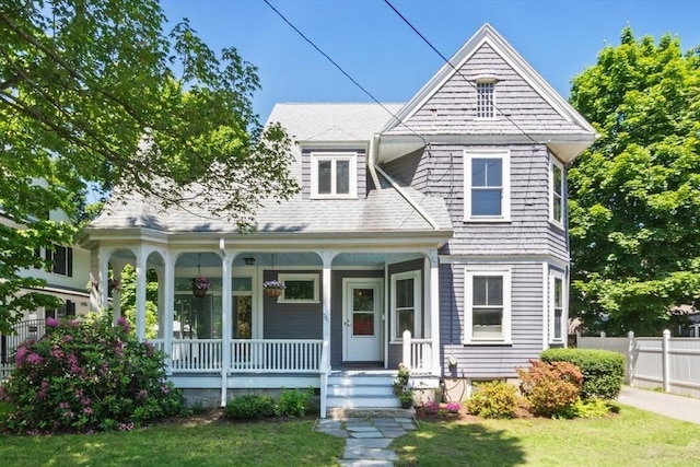 781 Highland Ave, Needham, MA 02494 - view of front of house with a porch
