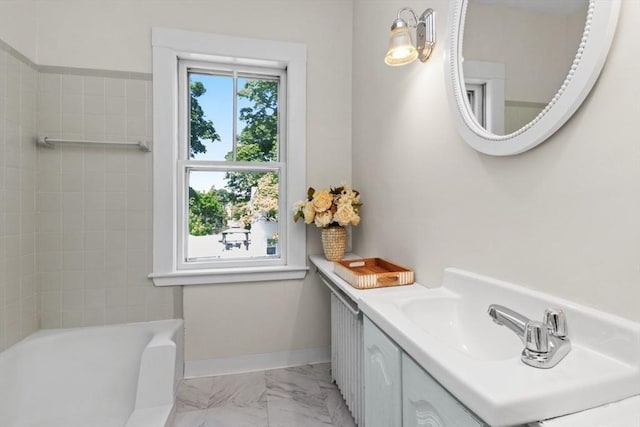 781 Highland Ave, Needham, MA 02494 - full bathroom with marble look tile flooring, vanity, baseboards, and bathing tub / shower combination