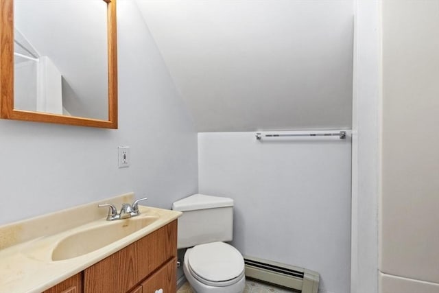 781 Highland Ave, Needham, MA 02494 - bathroom featuring baseboard heating, toilet, vanity, and vaulted ceiling