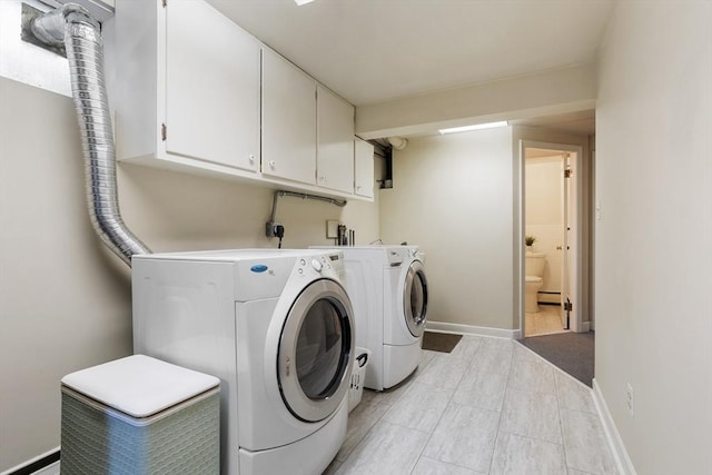15 Thoreau Rd, Acton, MA 01720 - laundry room with cabinet space, washing machine and dryer, and baseboard heating