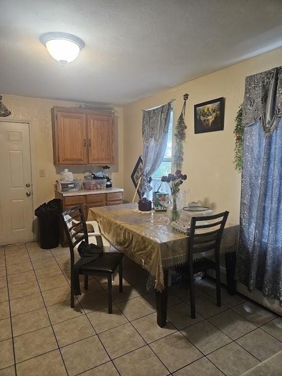 192 Chestnut St, Chelsea, MA 02150 - dining room featuring light tile patterned floors