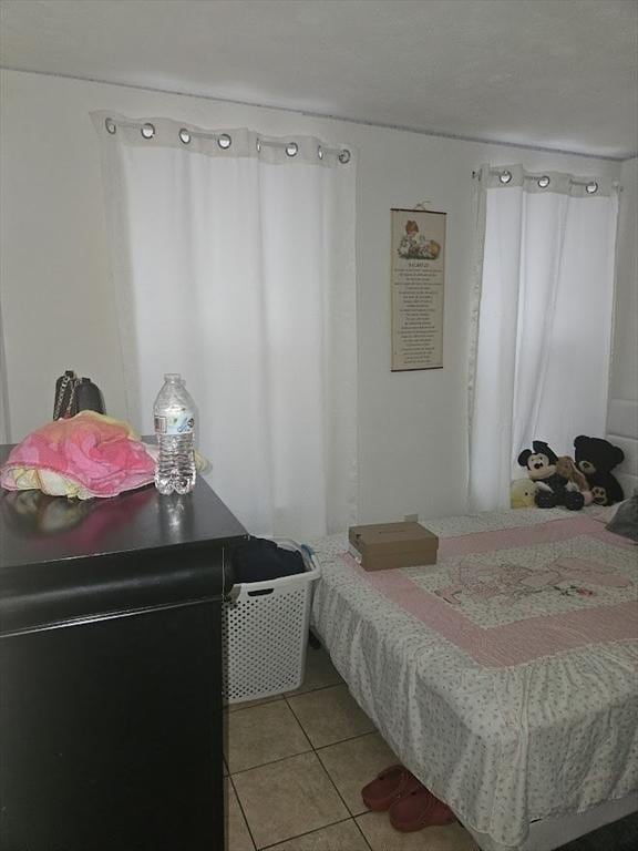 192 Chestnut St, Chelsea, MA 02150 - bedroom with light tile patterned floors