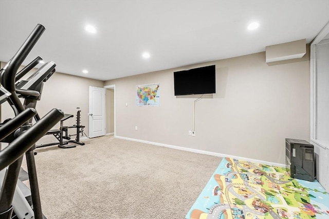 exercise room with light carpet